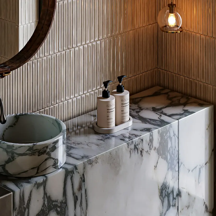 Close-up of marble tile and stone finish work in a bathroom